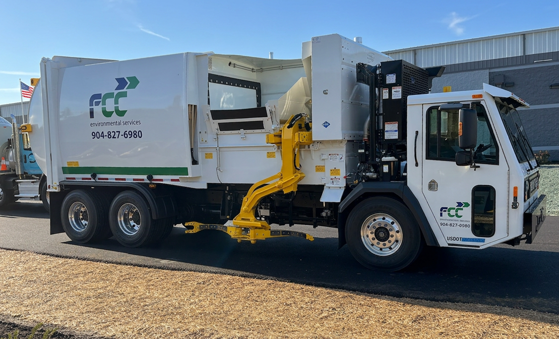 E-Z Pack Ranger automated side loader refuse collection truck
